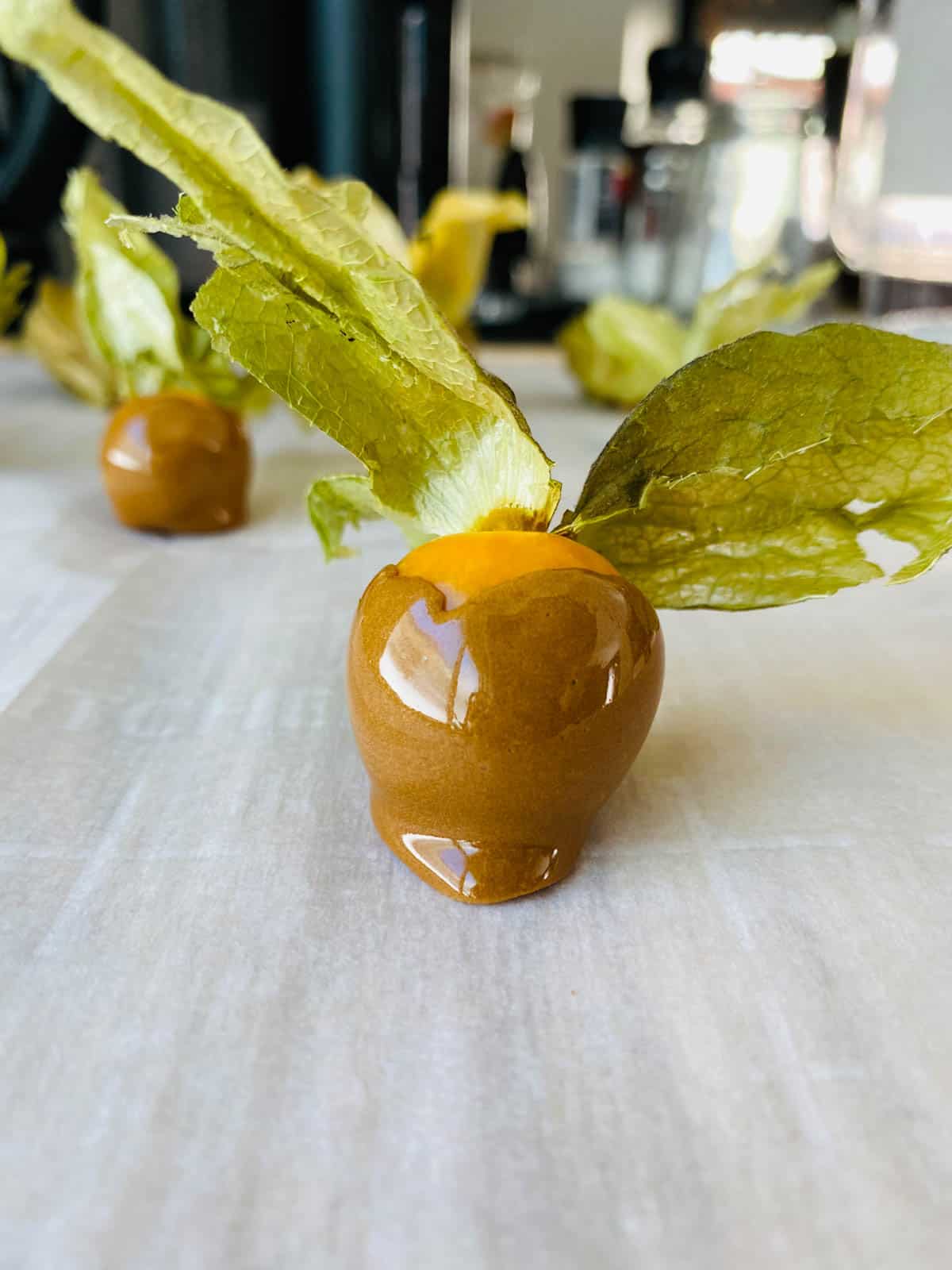 Cape gooseberry with caramel toffee coating