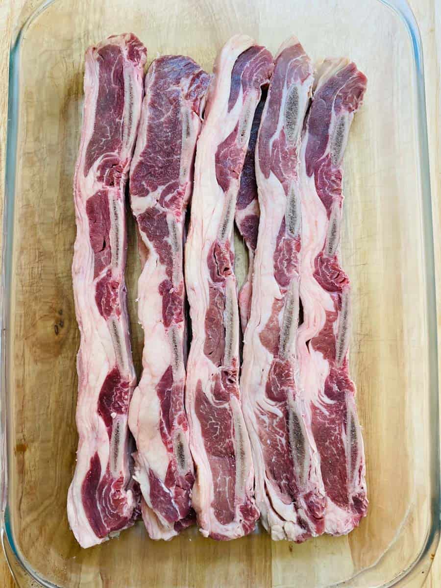Uncooked beef shorts ribs cut crosswise