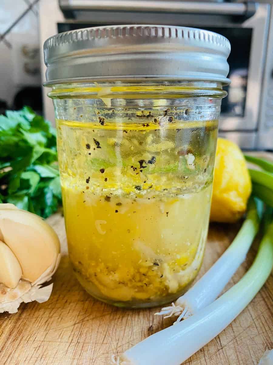 Lemon herb salad dressing in a mason jar