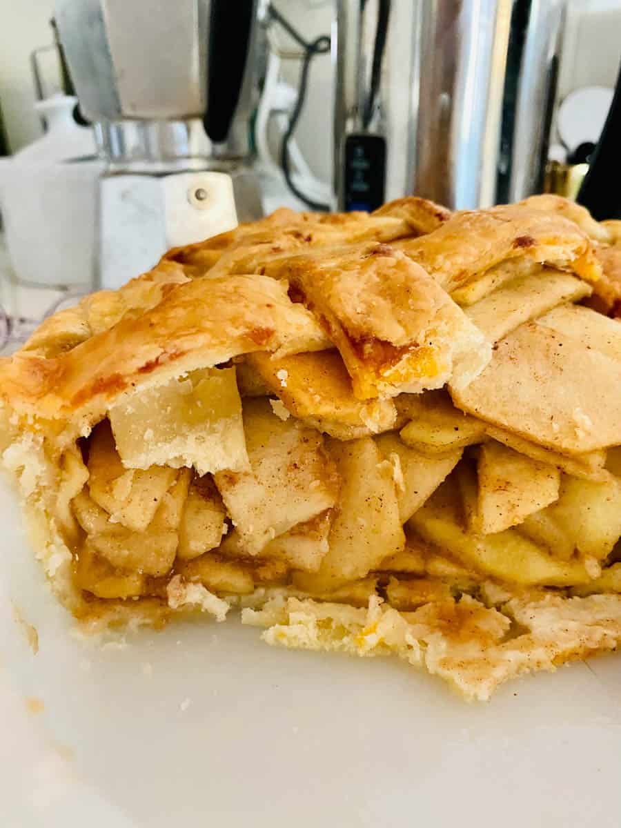 Side view of sliced apple pie
