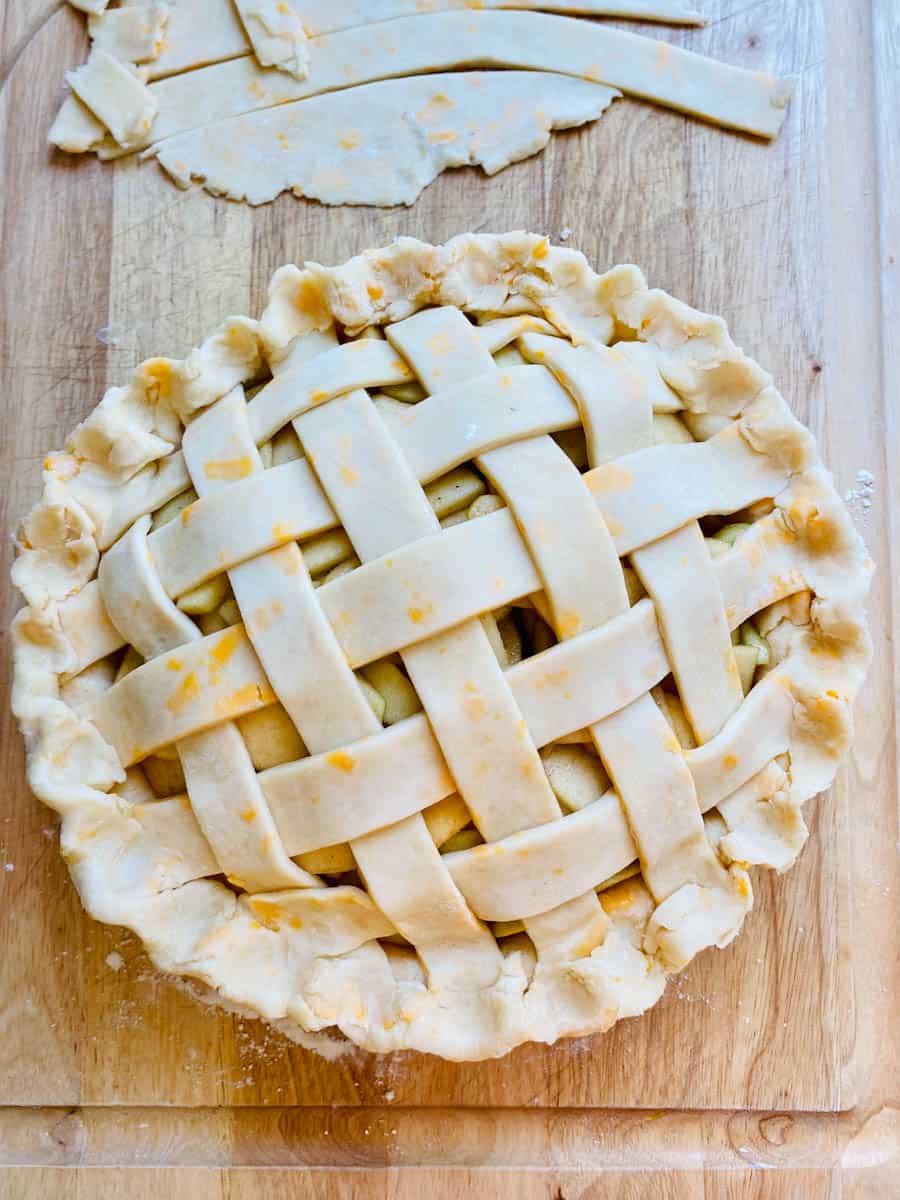 Unbaked apple pie with lattice crust