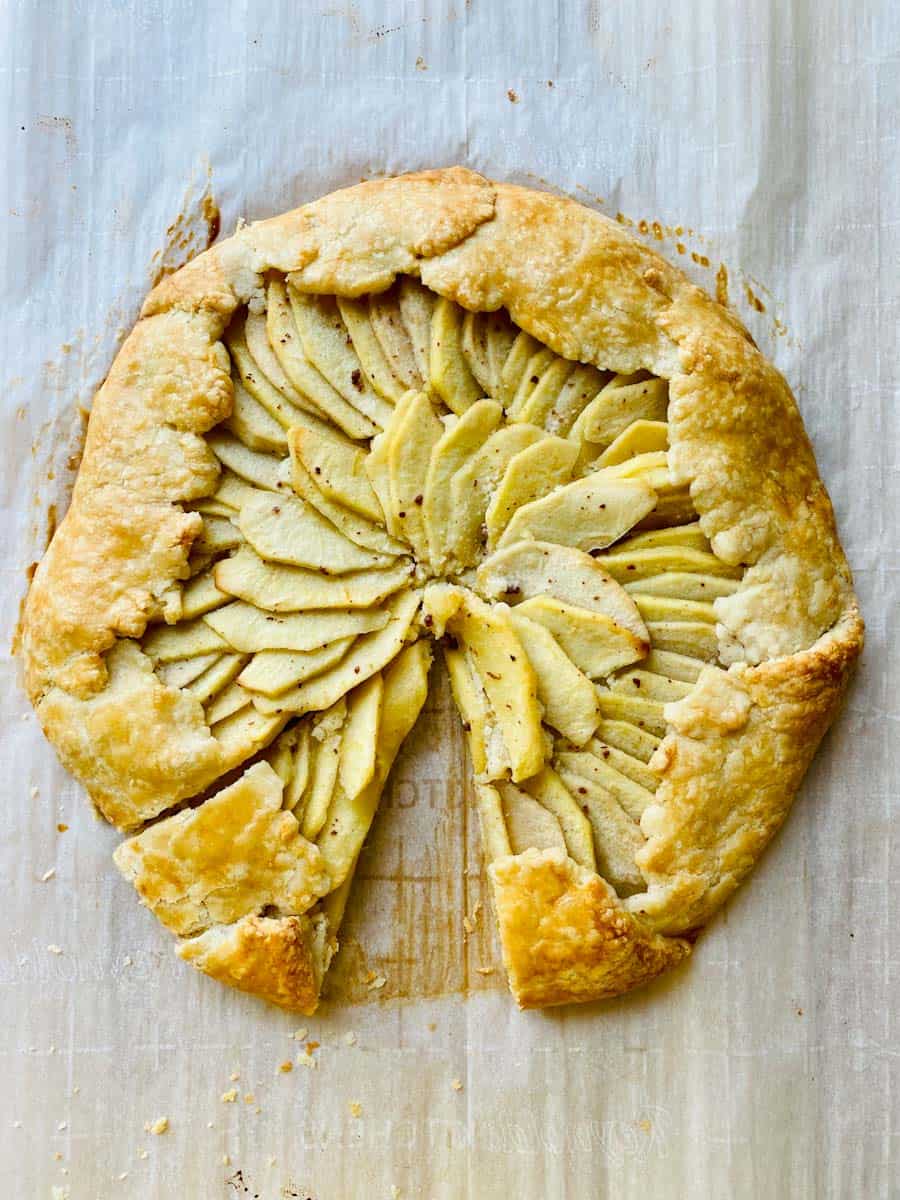 Apple Galette with Frangipane baked and with a slice taken out. Yes, it was eaten by me.