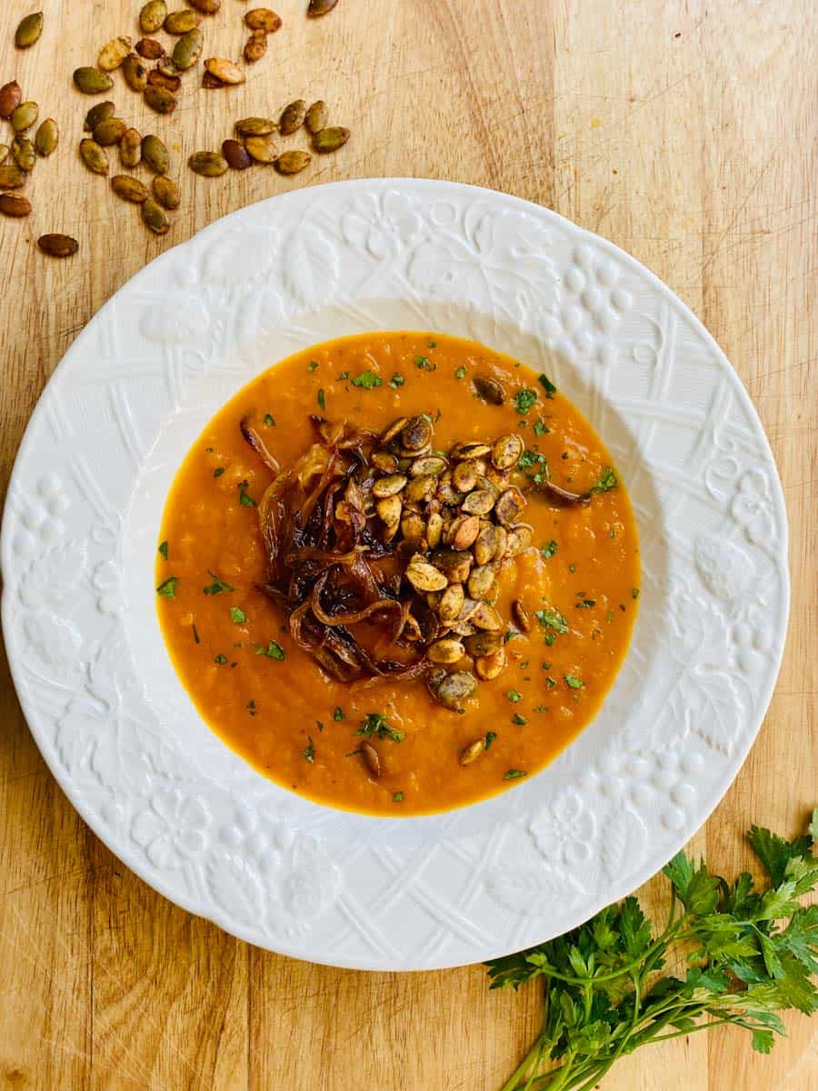 Bowl of Pumpkin Soup with Caramelized Onions.