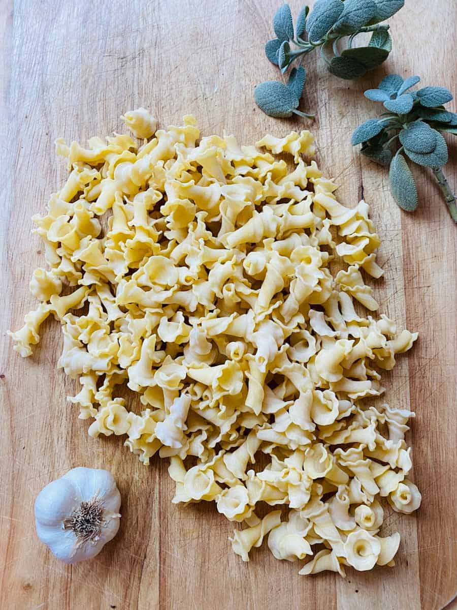 Dry campanelle pasta, fresh sage leaves, and fresh garlic. 