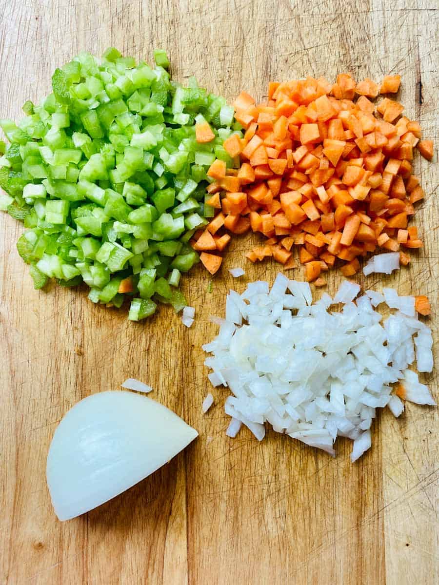 Celery, carrots, and onion. Chop, chop!