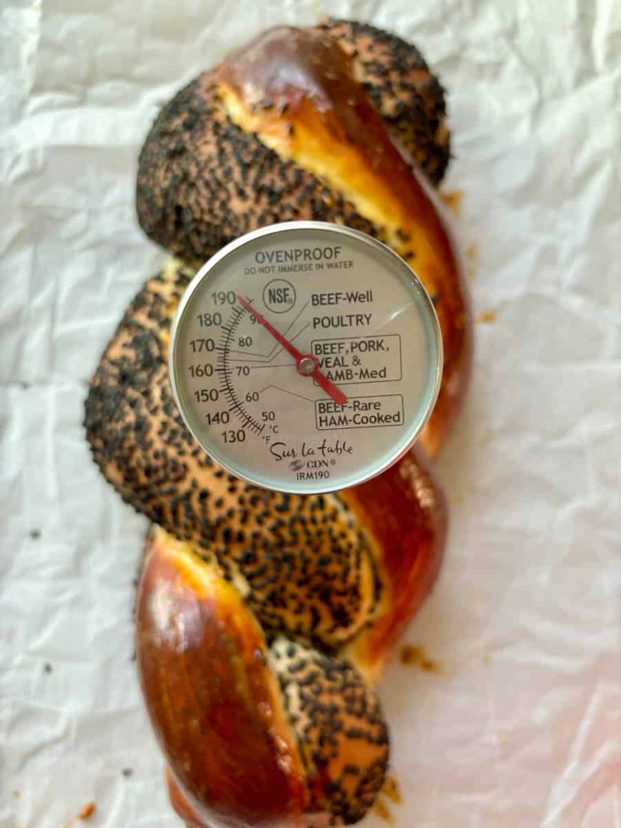 Bread with internal thermometer reading 195F.