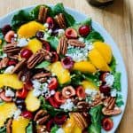 Kale salad with stone fruits and pecan.