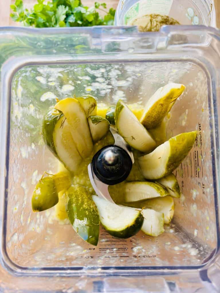 Dill pickles in a blender.