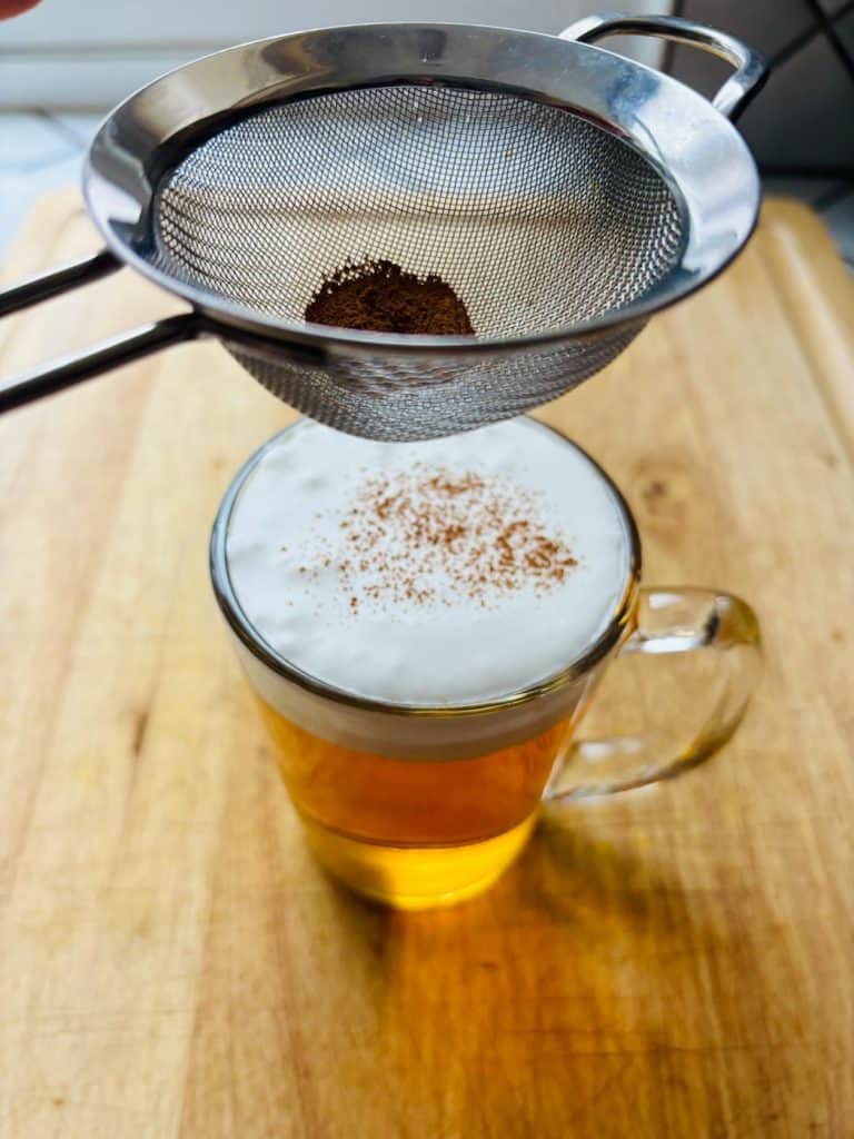 Dusting the top with ground cinnamon.