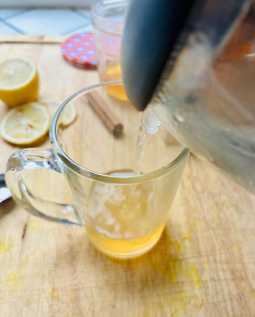 Pouring in the hot water.