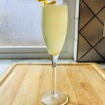 California 75 cocktail with lemon twist garnish.