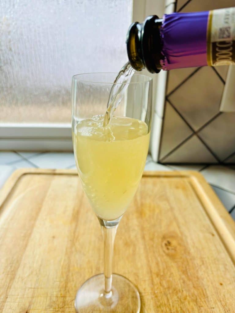 Topping it off with champagne.