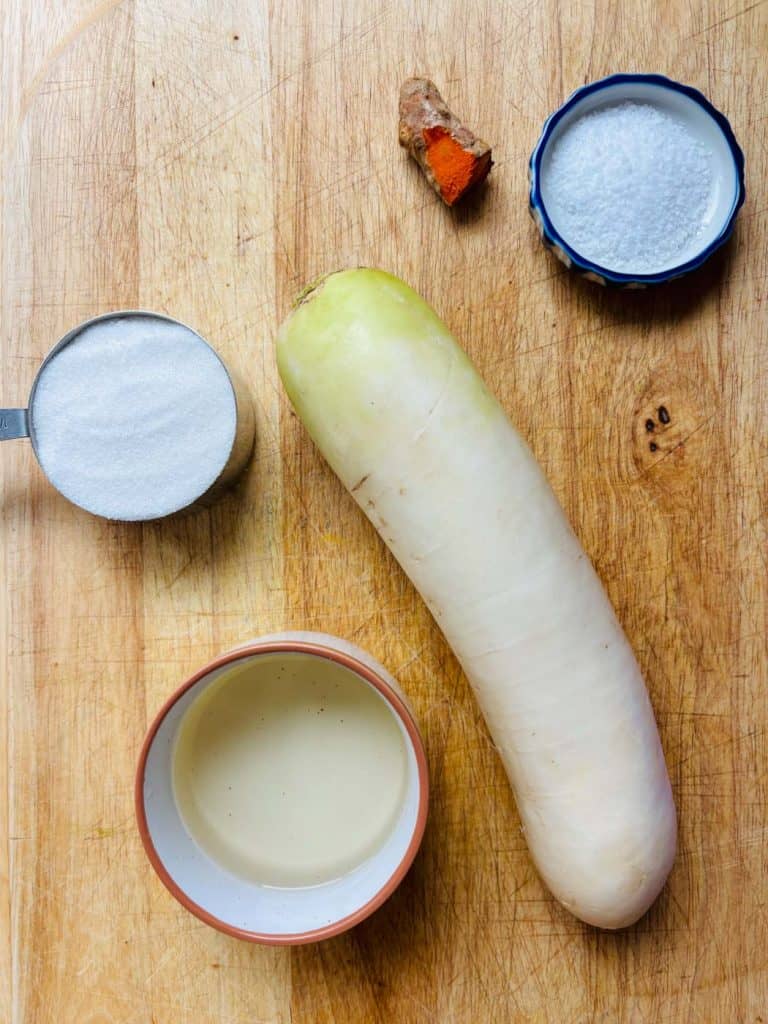Daikon radish, turmeric, salt, sweetener, and vinegar.