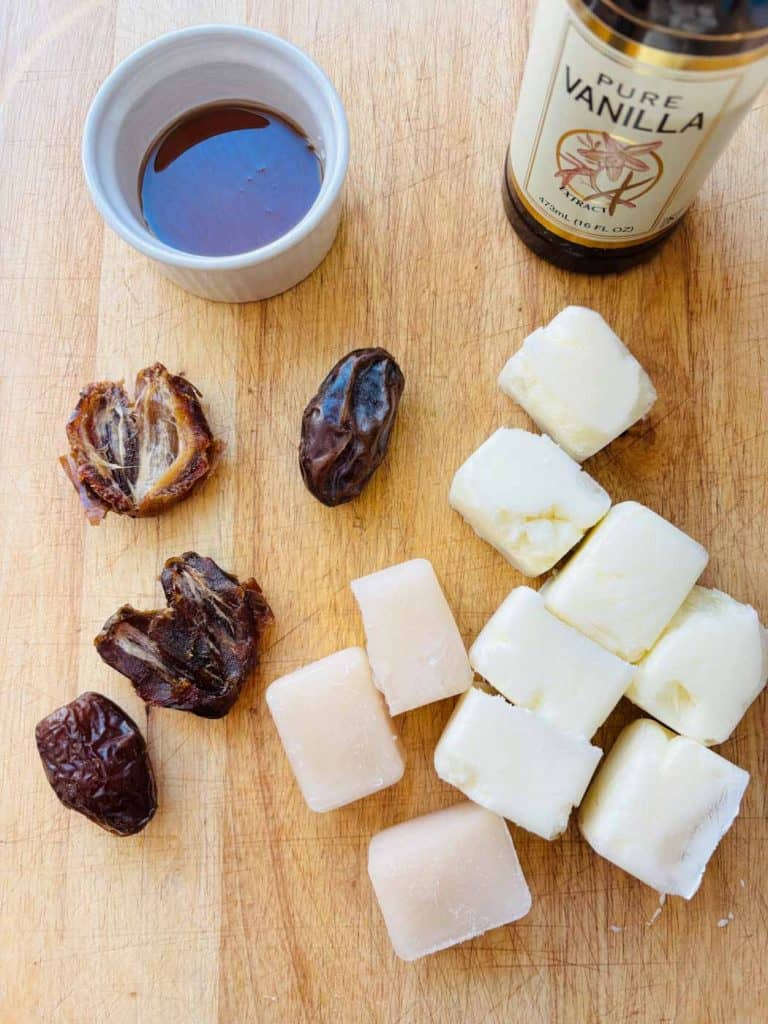 Maple syrup, vanilla extract, frozen yogurt and milk cubes, Medjool dates.