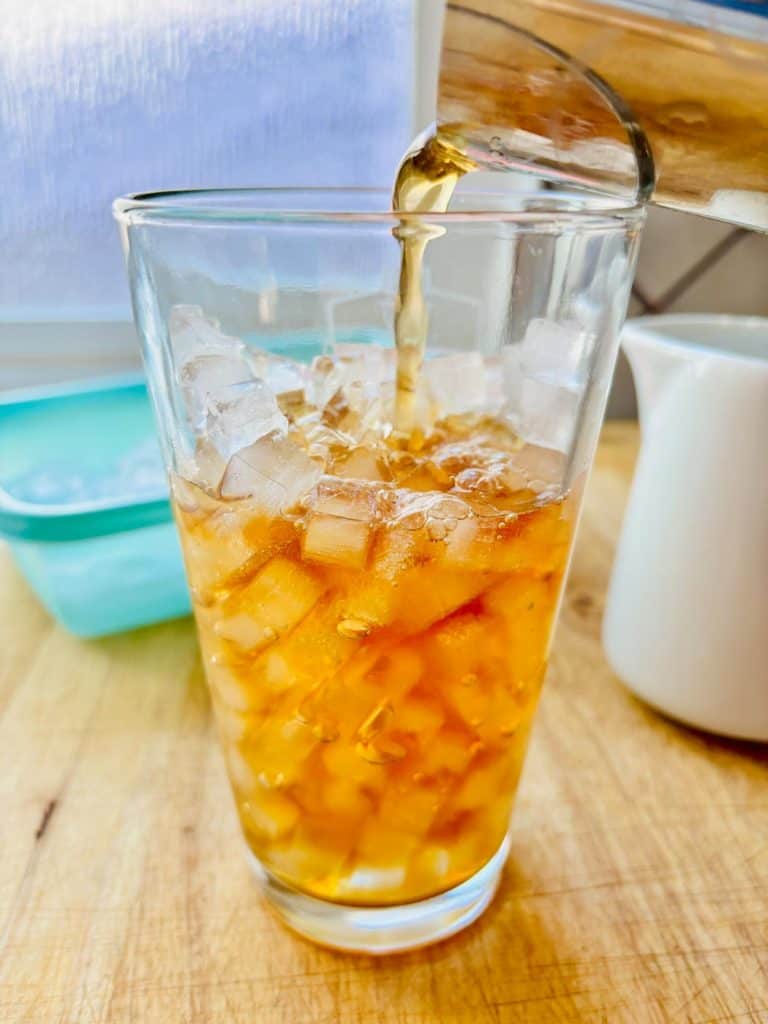 Tea poured over ice cubes.