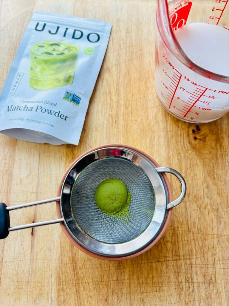 Matcha powder and almond milk.