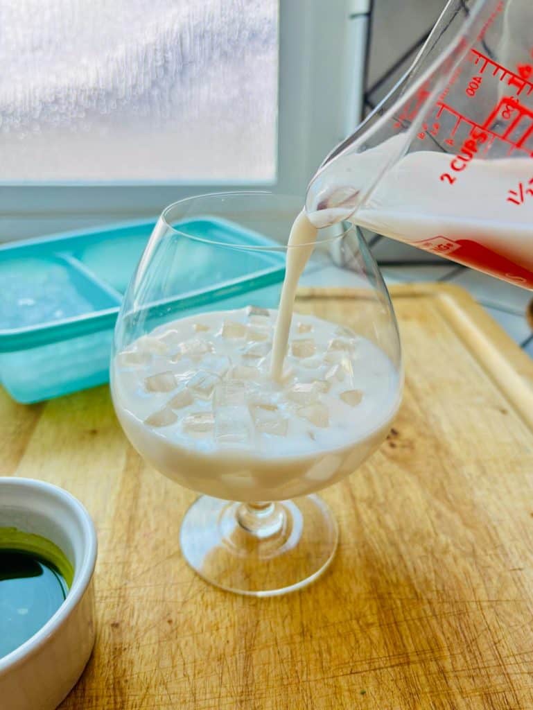 Milk poured over ice.