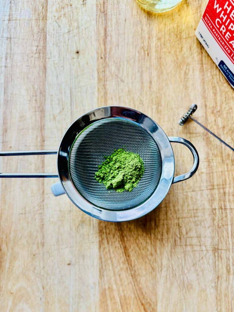 Sifting matcha powder.