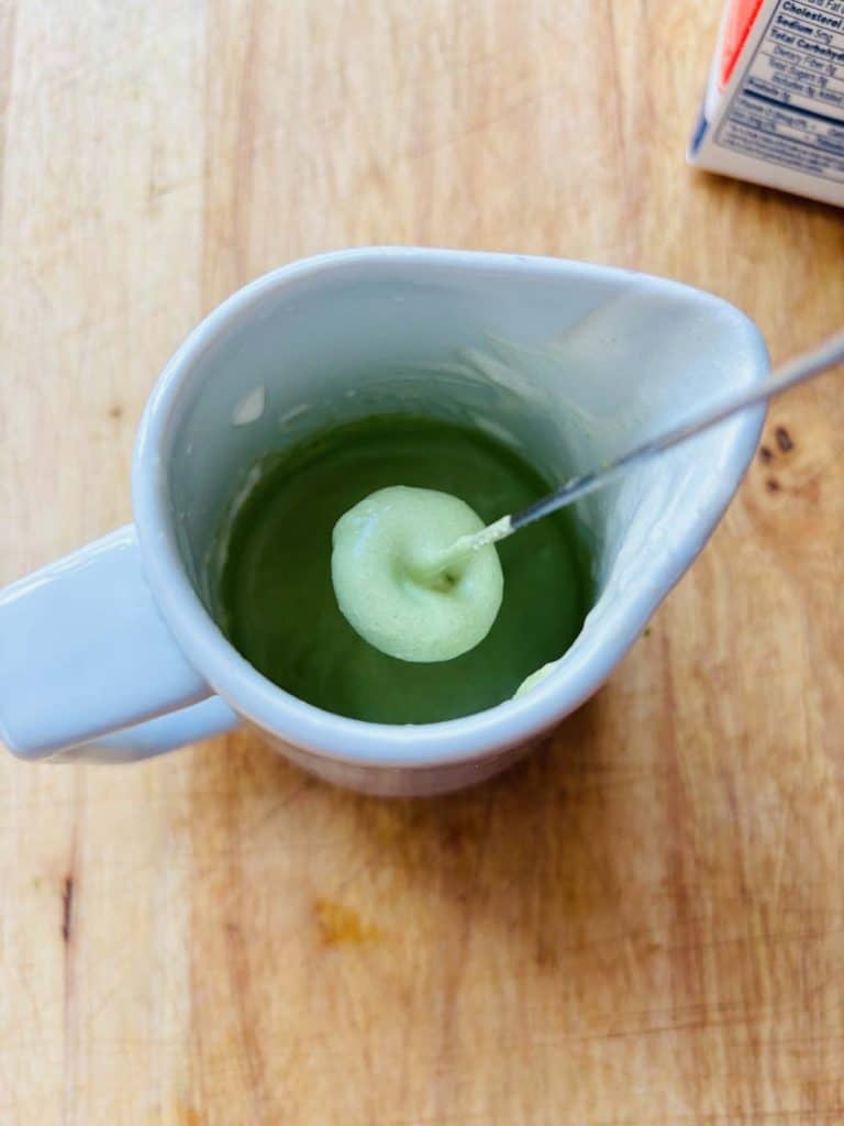 Whipping matcha with heavy cream.