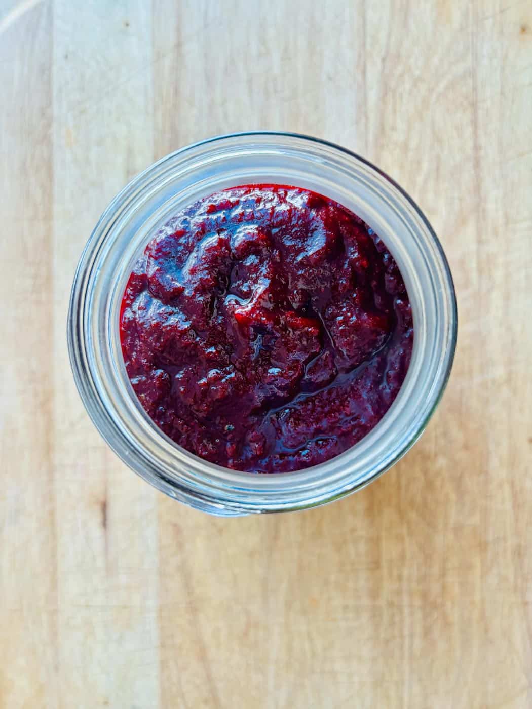 Overhead view of chamoy in jar.