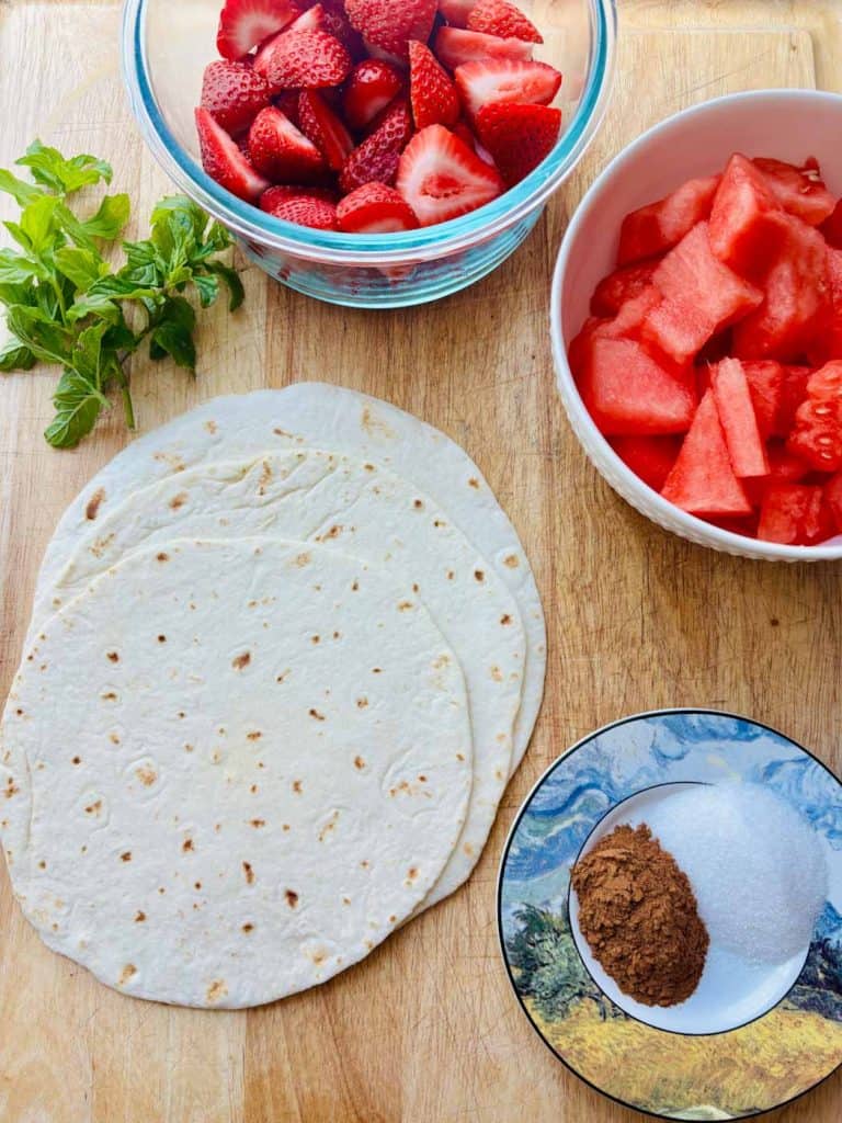 Strawberries, watermelon, cinnamon sugar, flour tortillas, and mint.