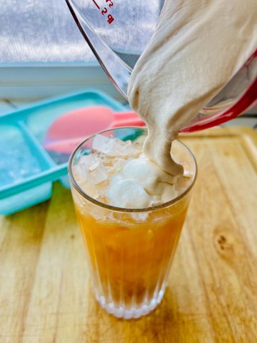 Cold Foam recipe poured onto an iced drink.
