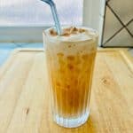 Iced Chai Latte with a straw.