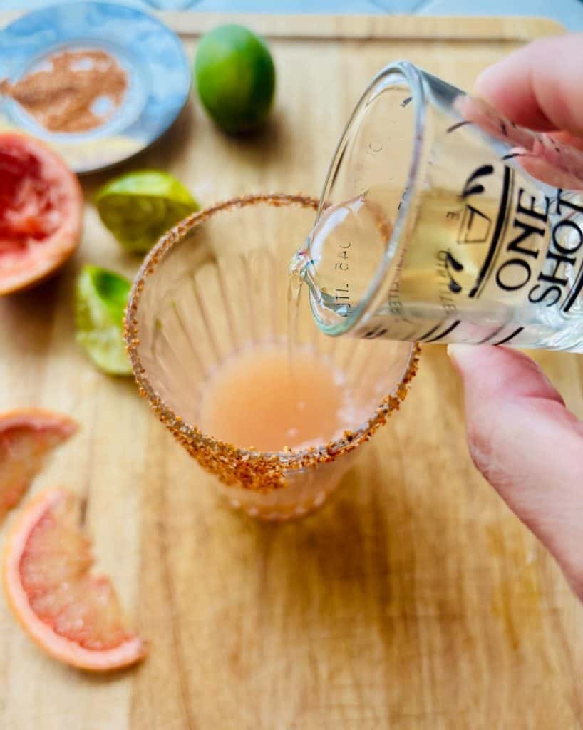 Tipping in the tequila.