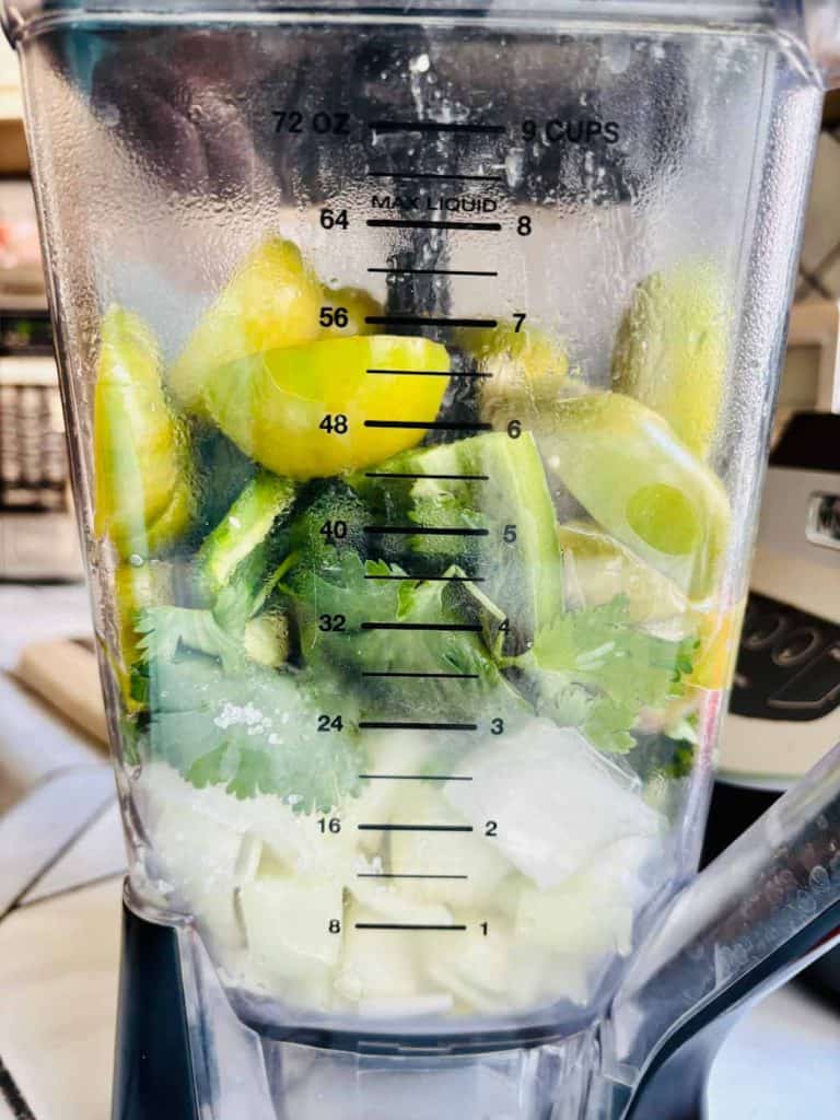 Salsa ingredients in a blender.