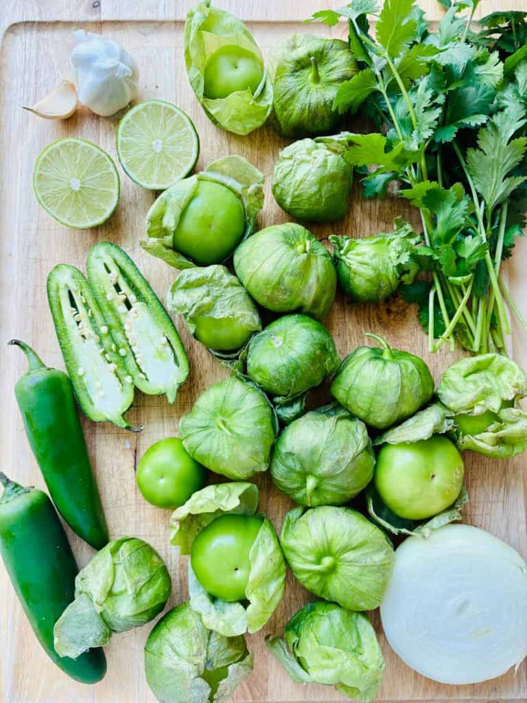 Garlic, lime, tomatillos, cilantro, onion, and jalapenos.