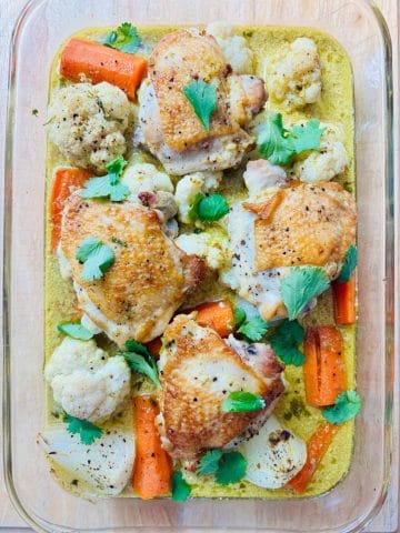 Curry chicken cauliflower bake in a baking dish.