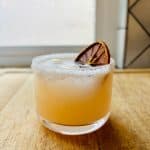 Salty Dog cocktail with garnish.