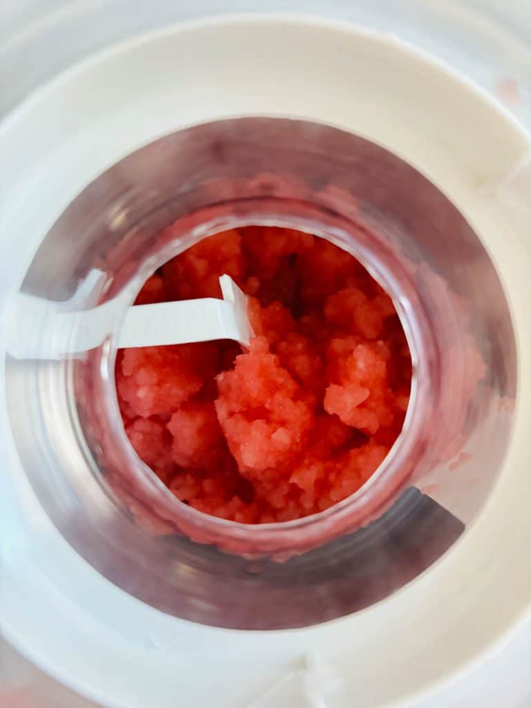 Sorbet churning in an ice cream maker.